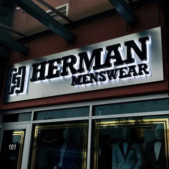 retail-store-sign-nigh-light